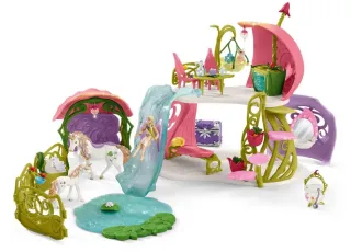 Maison-fleur pailletée avec licornes, lac et écurie